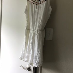 White romper beaded  neckline  w tags never worn.